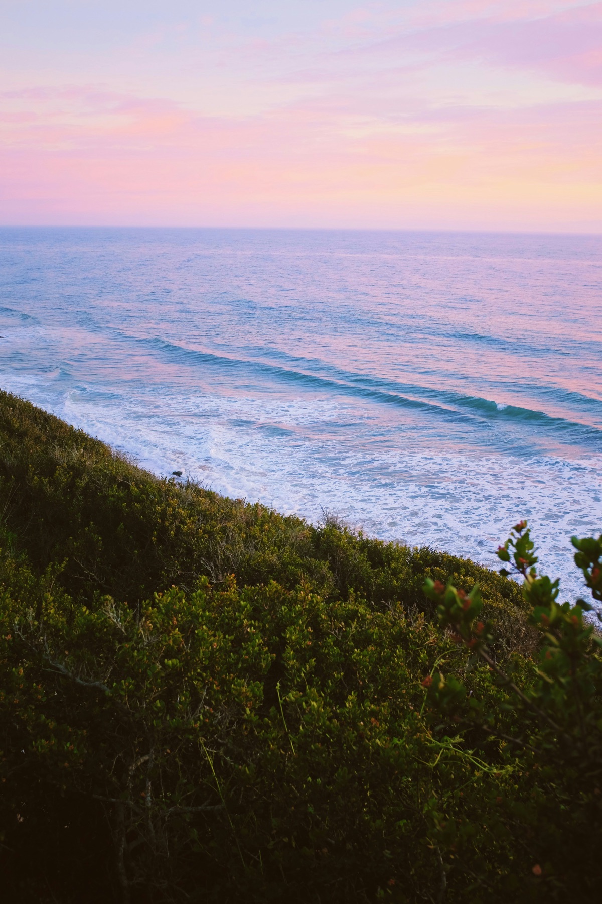 Sunset over the waves at a Carpinteria coastal bluff